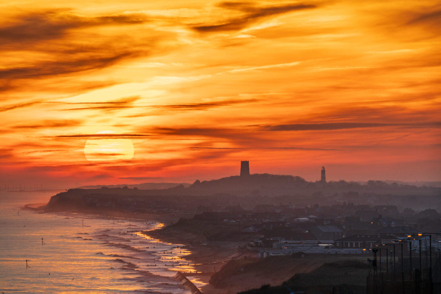 Sunrise over Happisburgh, from Mundesley